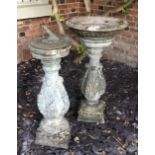 A CAST METAL SUNDIAL ON ACANTHUS RECONSTITUTED BASE AND MATCHING BIRD BATH.