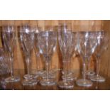 WATERFORD, IRISH, A SET OF SIX CHAMPAGNE FLUTES Along with six large wine glasses.