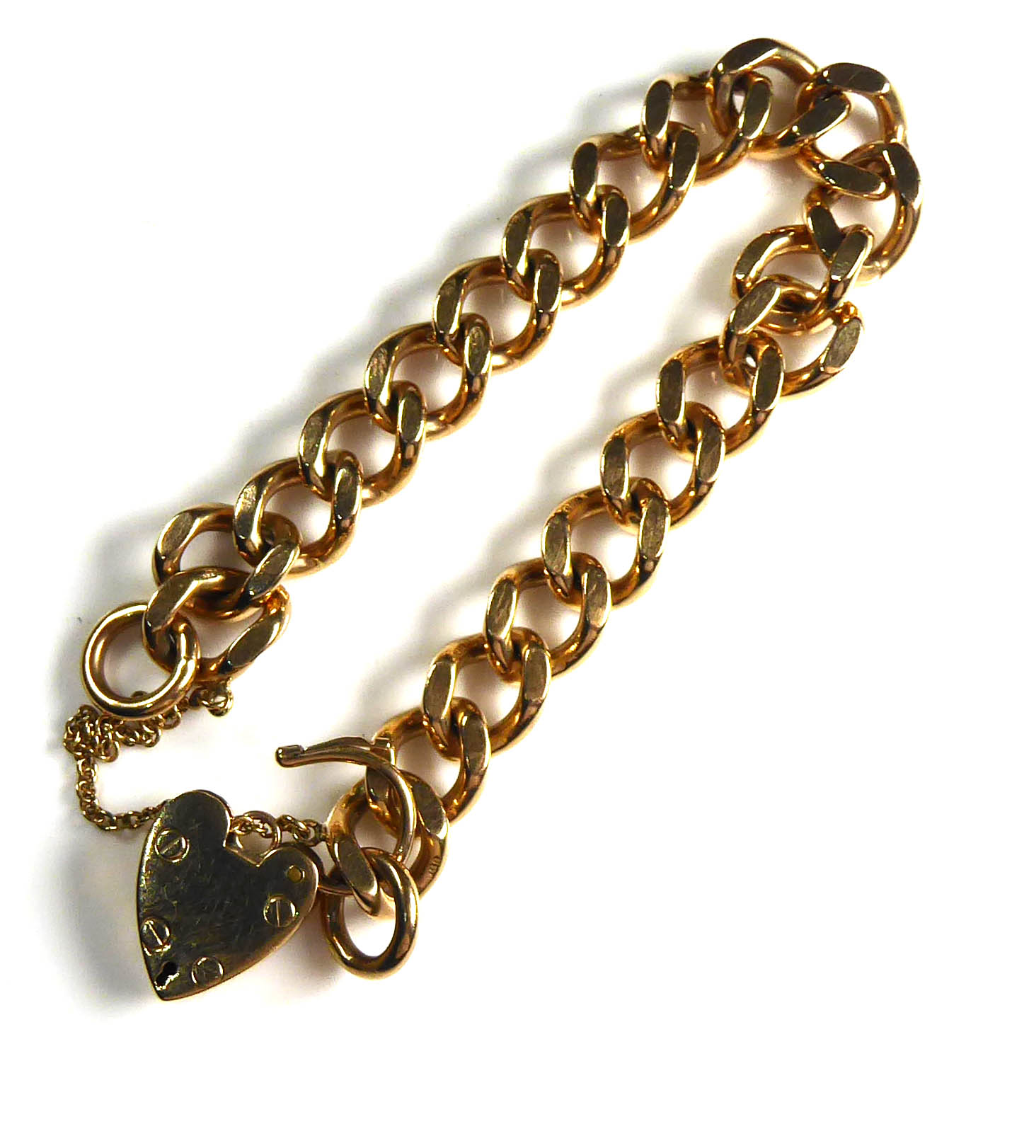 A VINTAGE 9CT GOLD BRACELET The curb link with heart form clasp. (approx 16cm)