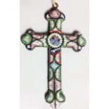 A VINTAGE GILT METAL MICROMOSIAC CRUCIFIX Having a beaded metal edge and set with multicoloured