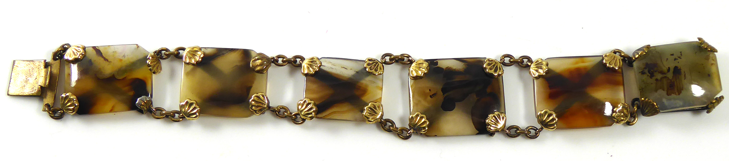 A VICTORIAN GILT METAL AND AGATE BRACELET Six rectangular agate panels held with shell form gilt