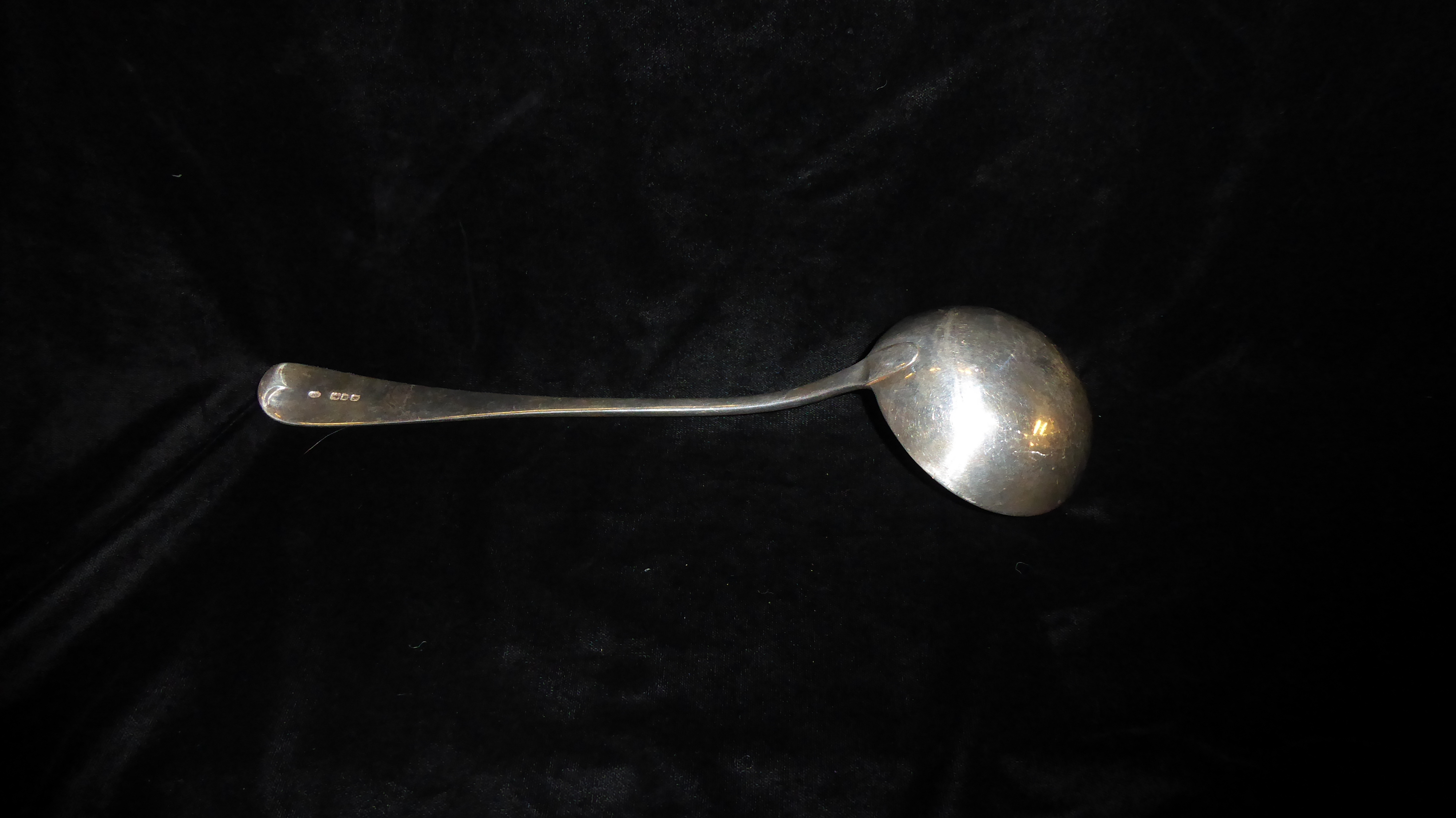 AN EARLY 20TH CENTURY SILVER SOUP LADLE Of plain form with engraved initial, hallmarked London, - Image 2 of 2