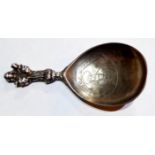 A LATE 17TH/EARLY 18TH CENTURY WHITE METAL ANOINTING SPOON Having a figural finial representing