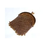 A 9CT GOLD CHAINMAIL DESIGN COIN PURSE With suspension ring.