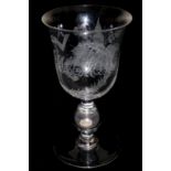 A LATE 19TH CENTURY GOBLET Having a hollow baluster stem enclosing a sixpence for 1873, the bowl