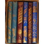 A BOXED SET OF SIX MINIATURE ALMOST SILK COVERED BOOKS With 'The Compliments of the Season' in