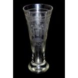 A 19TH CENTURY CONTINENTAL FIRING GLASS Of slender beaker form with everted rim engraved with