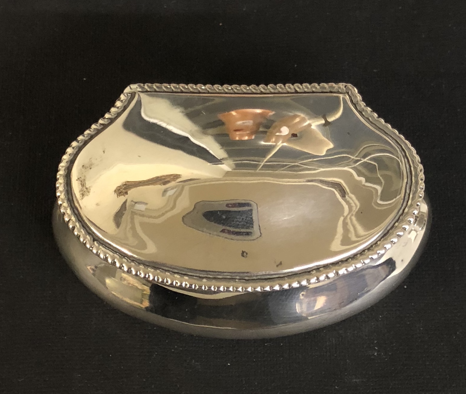 AN ENGLISH HALLMARKED SILVER SCROLLED BOX With gilded interior. (8cm x 5cm) - Image 2 of 2