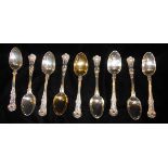 GEORGE ADAMS, A SET OF NINE VICTORIAN SILVER KINGS PATTERN DESSERT SPOONS. (approx 18cm)