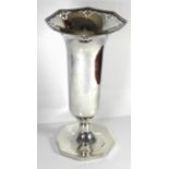AN EARLY 20TH CENTURY SILVER VASE With geometric form top and pierced decoration, hallmarked