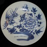 A CHINESE BLUE AND WHITE PORCELAIN CHARGER DISH Shallow form hand painted with a phoenix and