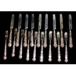AARON HADFIELD, A SET OF NINE WILLIAM VI SILVER FRUIT KNIVES AND FORKS Kings pattern handles with