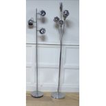 A COLLECTION OF THREE MODERN CHROME LAMPS Two floor standing with chrome effect shades and a smaller