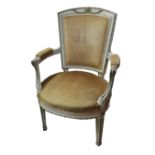 A 19TH CENTURY FRENCH CARVED WOOD AND PAINTED UPHOLSTERED ARMCHAIR With scrolling arms, raised on