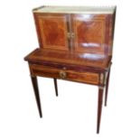 A 19TH CENTURY FRENCH ROSEWOOD AND KINGWOOD GILT METAL MOUNTED BONHEUR DE JOUR With two doors over a