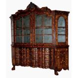 A LARGE AND IMPRESSIVE DUTCH MARQUETRY BOOKCASE The whole inlaid with floral marquetry, the upper