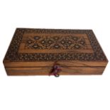 A 19TH CENTURY TUNBRIDGE WARE RECTANGULAR GAMES BOX Having a parquetry inlaid rosewood lid,