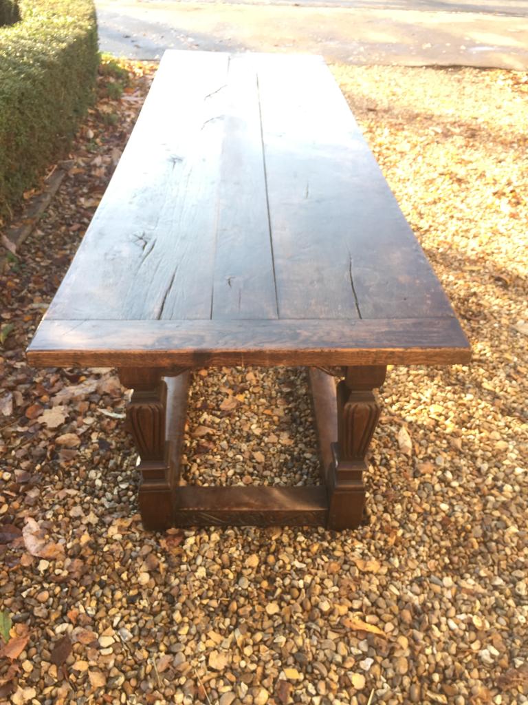 AN 18TH CENTURY AND LATER OAK REFECTORY TABLE With plank top, raised on square tapering and fluted - Image 2 of 6