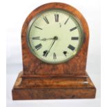 A 19TH CENTURY AMERICAN WALNUT MANTEL CLOCK Of architectural form with domed case, movement
