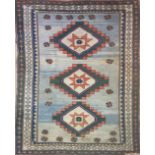 A MIDDLE EASTERN KILIM RUG Geometric design with three central gulls within frieze and running