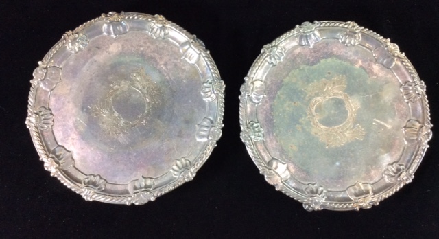 A PAIR OF GEORGIAN SILVER SALVERS Comprising a pair with gadrooned edges, hallmarked Elizabeth