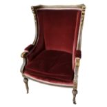A 19TH CENTURY FRENCH WING ARMCHAIR The walnut frame finely carved with leaves and florets,
