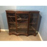 A 19TH CENTURY MAHOGANY FLOOR STANDING BREAKFRONT BOOKCASE With three astragal glazed doors