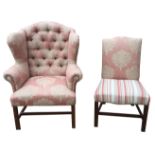 A GEORGE III DESIGN NEWLY UPHOLSTERED WINGBACK ARMCHAIR Raised on square section legs joined by a