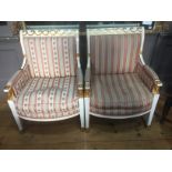 A PAIR OF 19TH CENTURY EMPIRE CARVED GILTWOOD AND PAINTED ARMCHAIRS The arms supported on sphinx