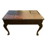 AN 18TH CENTURY DESIGN MAHOGANY WRITING TABLE With a three section tooled leather writing surface