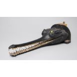 A LATE 19TH CENTURY TAXIDERMY GHARIAL MOUNTED HEAD. (h 19cm x w 25cm x d 65cm)