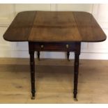 AN EARLY 19TH CENTURY MAHOGANY PEMBROKE TABLE With a single drawer and brass handles, raised on ring