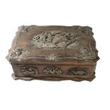 A 19TH CENTURY OAK BOX Applied with copper plaques, decorated with hunting dogs and floral