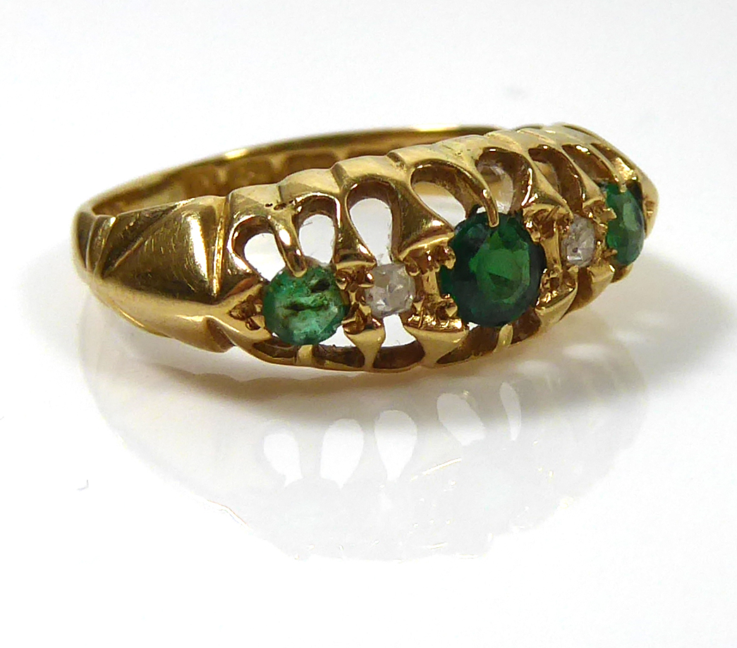 A VINTAGE 18CT GOLD, EMERALD AND DIAMOND RING Three graduating emeralds interspersed with - Image 2 of 2