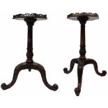 A MATCHED PAIR OF GEORGE III CHIPPENDALE DESIGN TRIPOD KETTLE STANDS The hexagonal pierced gallery