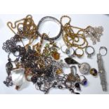 A SELECTION OF COSTUME JEWELLERY To include a silver dress ring set with a single paste stone, a