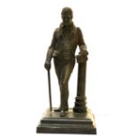 A LATE 19TH CENTURY IRON STATUE OF AUTHOR, WALTER SCOTT On a plinth base. (20cm)