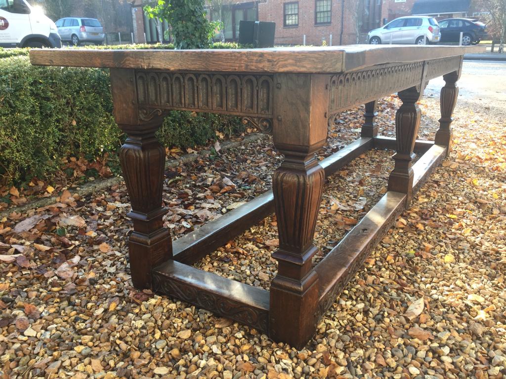 AN 18TH CENTURY AND LATER OAK REFECTORY TABLE With plank top, raised on square tapering and fluted - Image 5 of 6