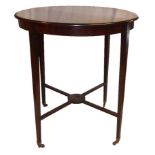 EDWARDS & ROBERTS, AN EDWARDIAN MAHOGANY CIRCULAR OCCASIONAL TABLE The square tapering legs