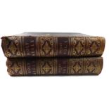 A SET OF 19TH CENTURY LEATHER BOUND BIBLES 'The Douay Translation', two volumes, with tooled leather