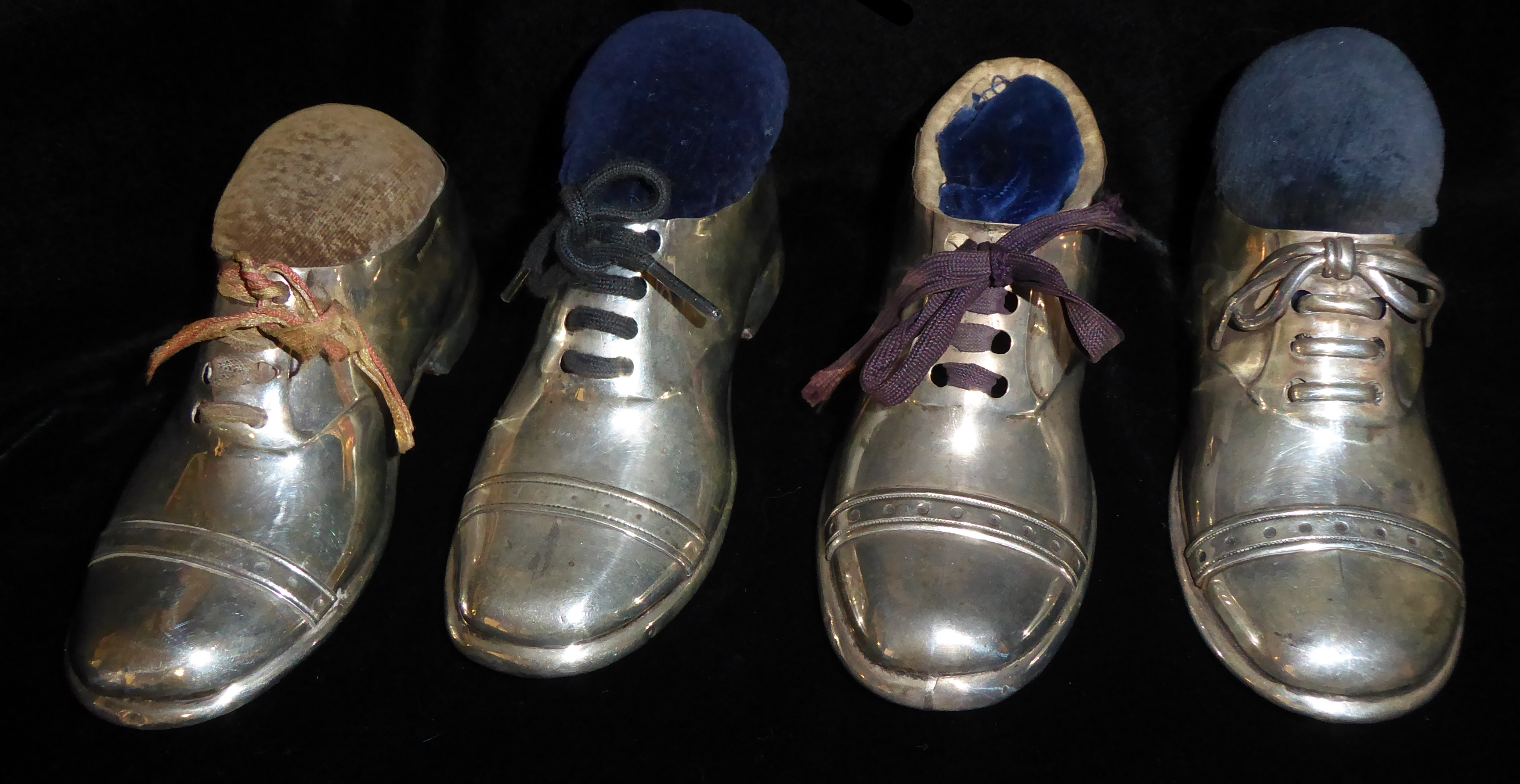 A COLLECTION OF FOUR EDWARDIAN NOVELTY SILVER SHOE PIN CUSHIONS Each having a wooden base, three - Image 4 of 4