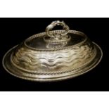 OMAR RAMSDEN, A LARGE ARTS & CRAFTS SILVER OVAL ENTRÈE DISH AND COVER With planished finish, the