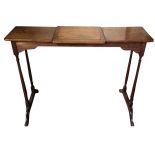 A 19TH CENTURY MAHOGANY READING/MUSIC TABLE With adjustable strut central section, raised on