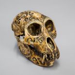 A LATE 19TH/EARLY 20TH CENTURY DAYAK TRIBE HEADHUNTERS CARVED TROPHY MONKEY SKULL. (h 10cm x w