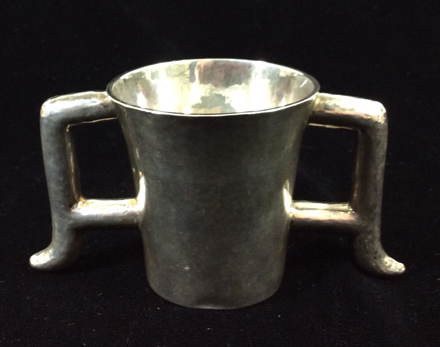 A VICTORIAN SCOTTISH SILVER CUP Twin handles with planished decoration, hallmarked Hamilton &