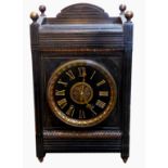 A LARGE 19TH CENTURY ARTS & CRAFTS POLISHED SLATE MANTLE CLOCK The black dial with Roman numeral