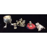A COLLECTION OF NOVELTY SILVER ITEMS To include an owl brandy label and desk seal, a miniature teddy