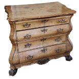 AN 18TH CENTURY DUTCH BLEACHED WALNUT BOMBE COMMODE The cartouche top above four long drawers,