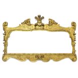 MANNER OF JOHN BELCHIER, A PAIR OF 19TH CENTURY CARVED GILTWOOD FRAME WALL MIRRORS Each surmount