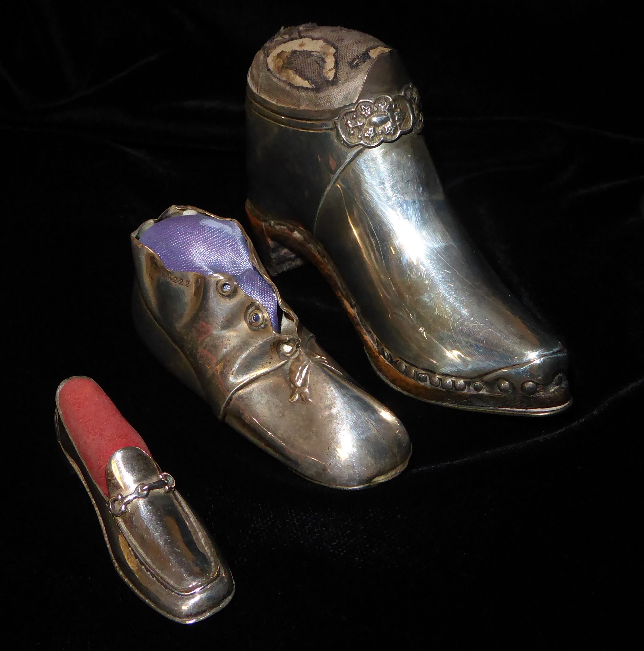 A COLLECTION OF FOUR EDWARDIAN NOVELTY SILVER SHOE PIN CUSHIONS Each having a wooden base, three - Image 3 of 4